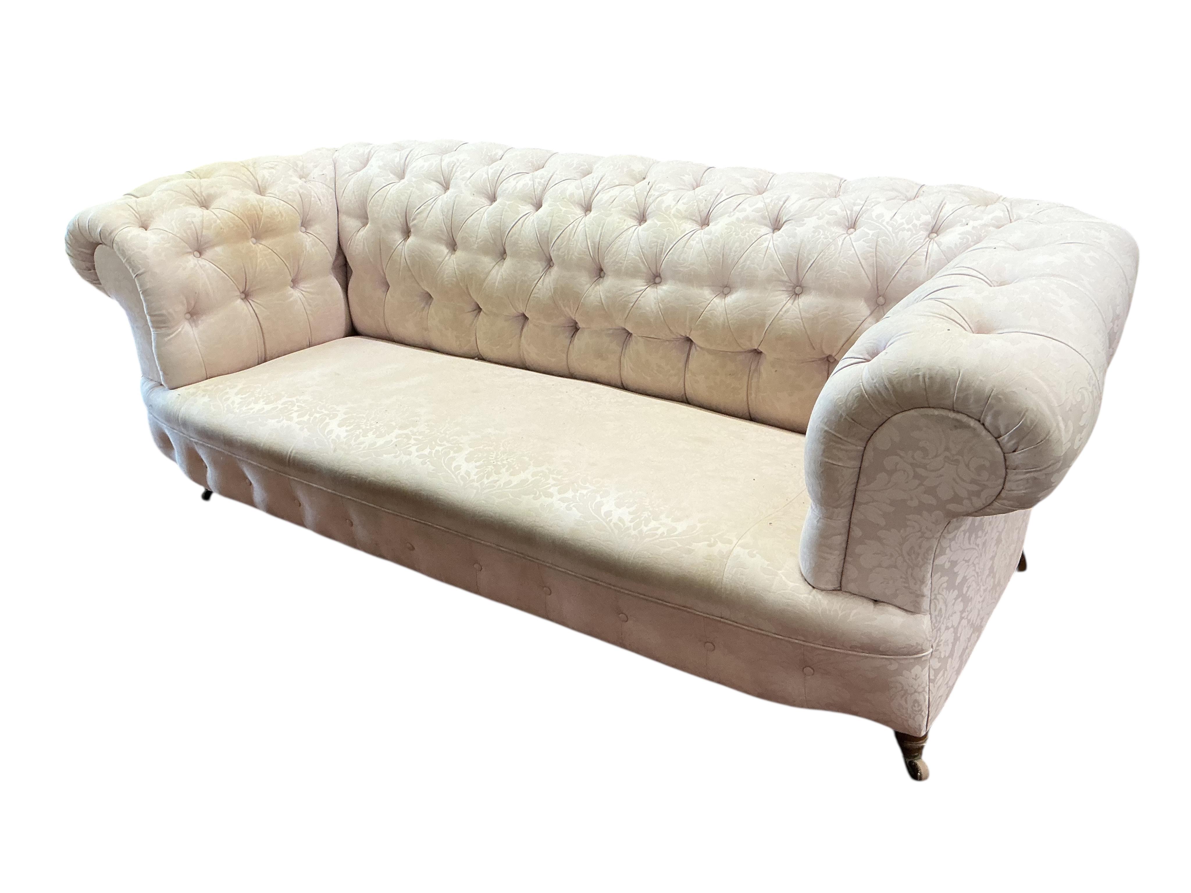 A Victorian deep buttoned Chesterfield settee, width 236cm, depth 91cm, height 84cm